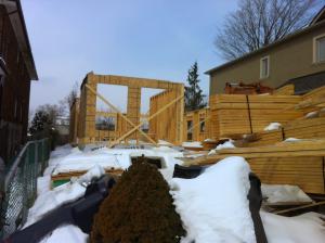 Building frame snow covered ground.